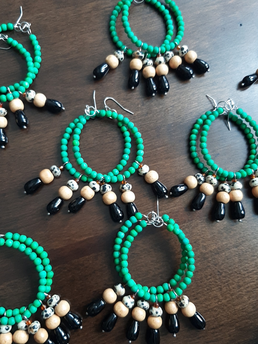 Handmade Green Beaded Hoop Earrings with Black and Natural Accents Onix